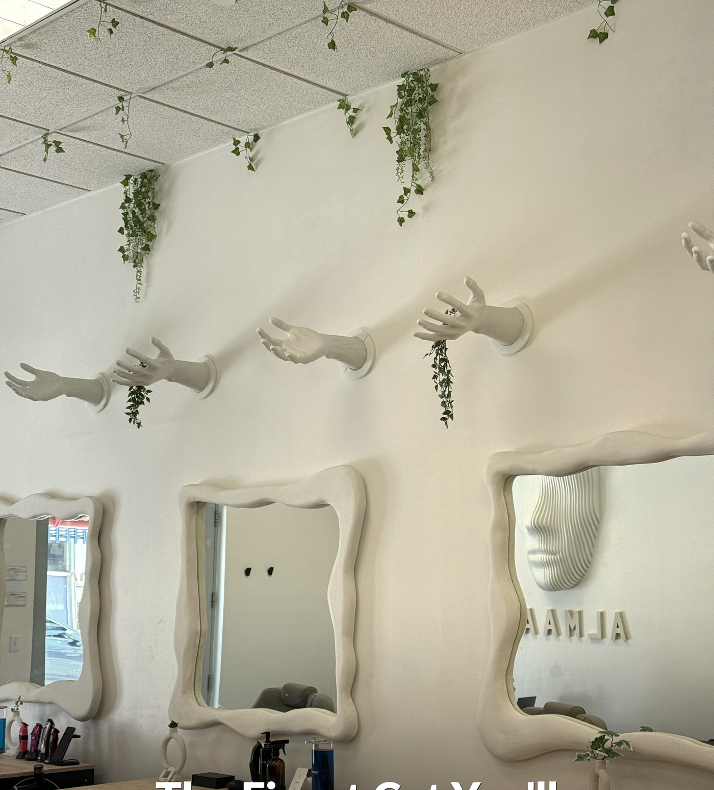 ALMAAN studio — wavy sculptural mirrors and hand sculptures